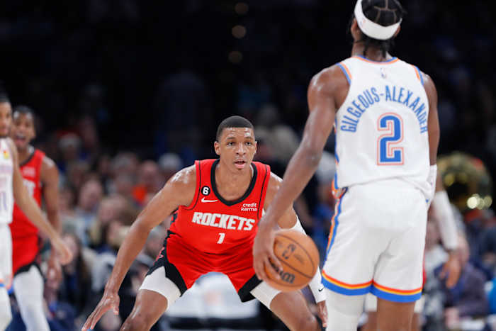Rockets forward Jabari Smith Jr. defends Oklahoma City Thunder guard Shai Gilgeous-Alexander